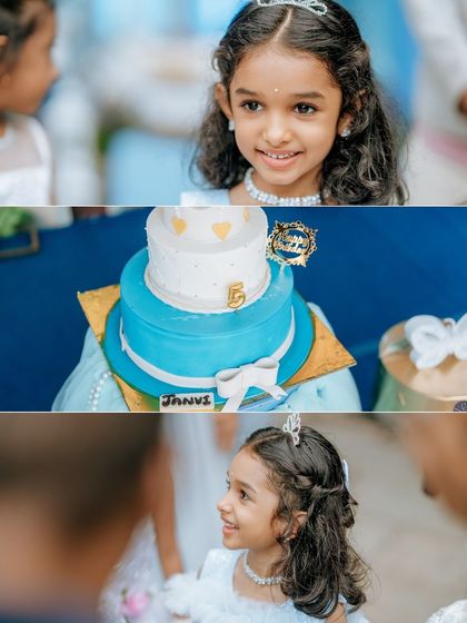 The birthday cake is the centerpiece of the celebration. This two-tiered creation perfectly matched the blue and white theme, complete with a number '5' to mark the special milestone.