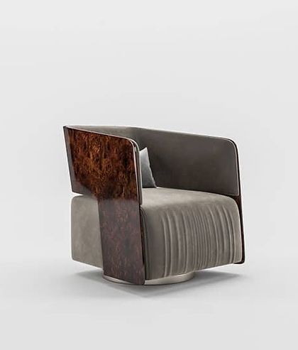 This angle of the Levi Armchair shows the beautiful contrast between the smooth, rich wood and the soft, pleated fabric on the seat.