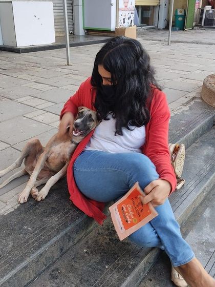 A quiet moment with a street dog during my certification celebration. These are the connections that inspire my work every day.