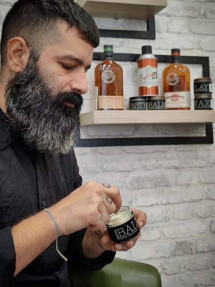 Here I am with some grooming products from 1821 Man Made. Using a quality beard balm is essential for keeping a long beard like mine healthy and well-styled.