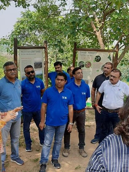 Our team briefs the Valvoline Cummins volunteers at the nursery, using informational boards to explain our rewilding philosophy.