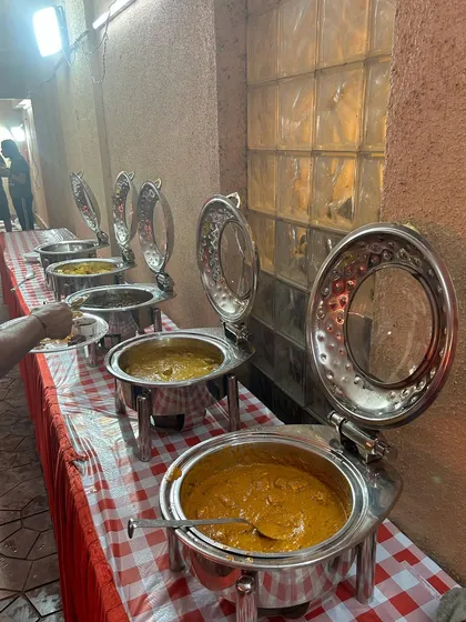 A full buffet line ready for a Holi party. My menu for festive events often includes classics like chole, paneer makhani, and more to keep the energy high.