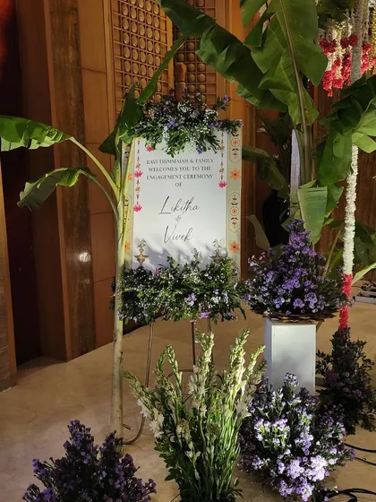 Another view of the beautiful welcome setup, showing how we use banana plants and floral arrangements to create a grand entrance.