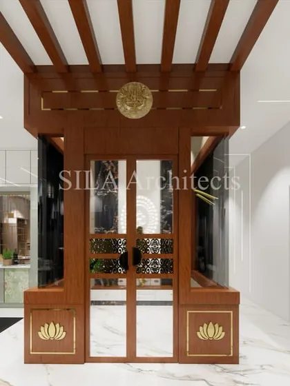 A beautifully rendered traditional pooja unit with intricate wooden details, integrated into a modern living space. This shows our skill in blending different design styles.
