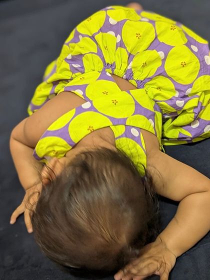 Some dresses are for little moments stitched in cotton. This one has been through a whole day of baby adventures, from crawling on the couch to napping, and still looks adorable.