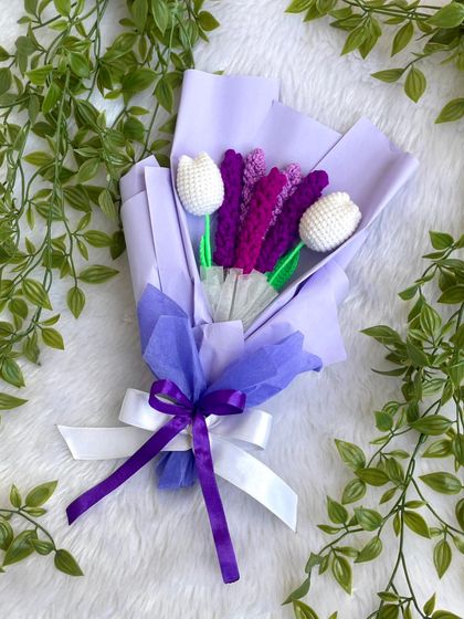 A slightly different angle of the lavender and tulip bouquet, showing the lovely textures of the crochet flowers and the soft ribbons.