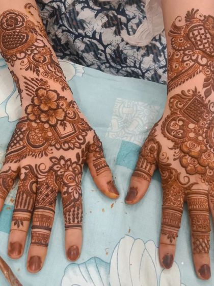 Mehendi Art by Nishat - Mehndi (Henna) Artistry Elegant Henna for Guests & Parties photo 41