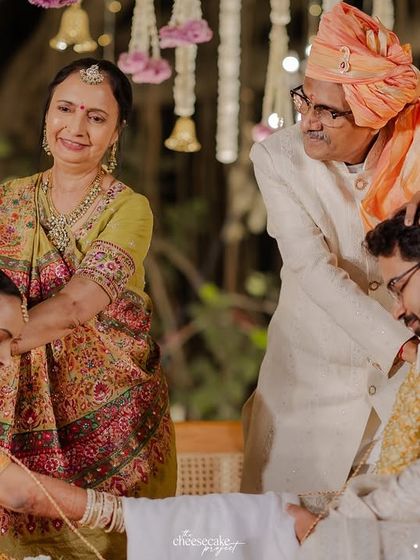 Parents blessing the couple during a traditional Gujarati wedding ceremony. A moment of respect and love.