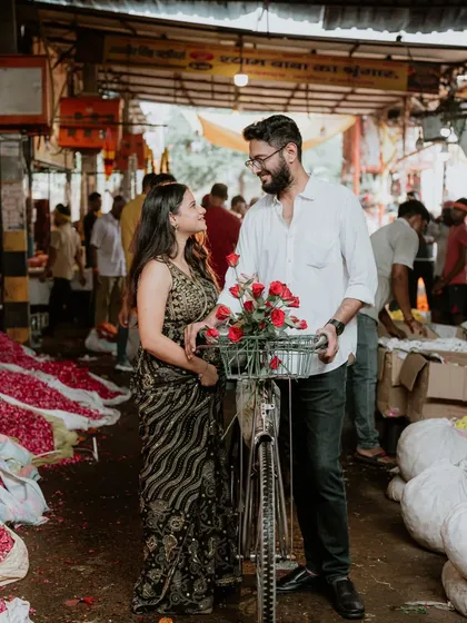 A location doesn't have to be a palace to be beautiful. We went to the Ghazipur flower market in Delhi for this shoot, using the vibrant colors and bustling energy to create a truly unique and authentic pre-wedding story.