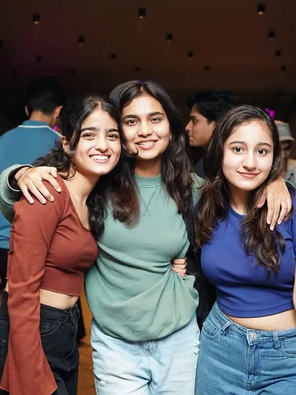 A candid moment between friends on the dancefloor. These are the memories that last.