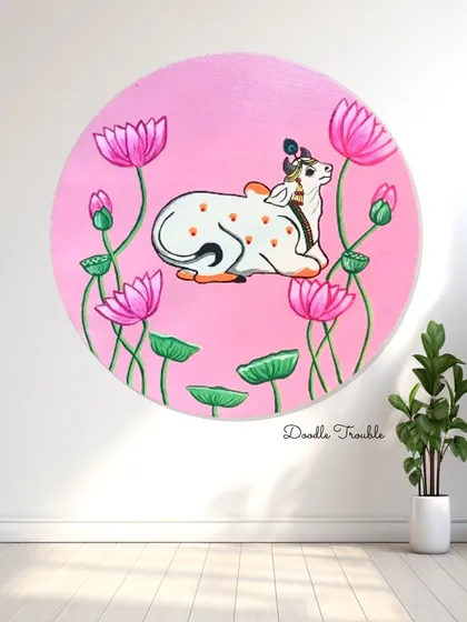 Inspired by the timeless beauty of Pichwai, I create pieces like this serene cow surrounded by lotuses on a round canvas. It's a modern take on a sacred tradition, bringing peace and storytelling into your home.