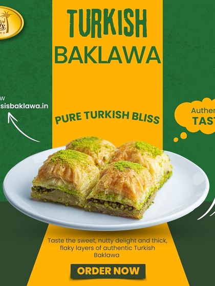 Pure Turkish bliss. Four pieces of our classic pistachio baklava served on a plate, showcasing the flaky layers and generous nutty filling.