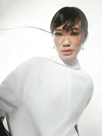 Defying conventions with every blink. This editorial makeup plays with texture and movement, using extra-long lashes that catch the air.