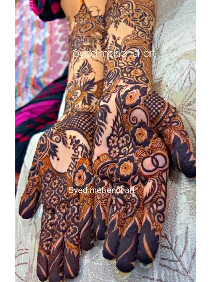 Another view of the engagement design, showing the full hands.