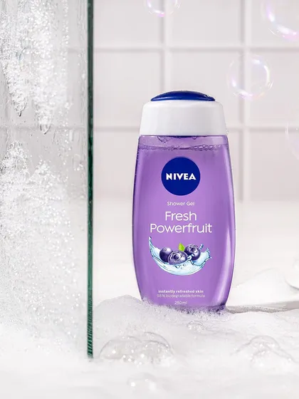 Another take on a shower scene, this time for Nivea's Fresh Powerfruit gel. I used a glass partition with water droplets and foam to simulate a steamy shower environment, making the product look invigorating.