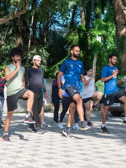 The team warming up together at a Saturday Surge. We start every session with dynamic movements to prepare the body for the work ahead.