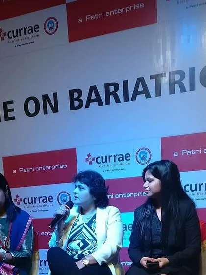 On stage for a Continuing Medical Education (CME) event focused on Bariatric Nutrition. These sessions are vital for sharing knowledge among healthcare professionals to improve patient support.