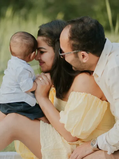 A tender moment between parents and their baby. The love in this photo is palpable.