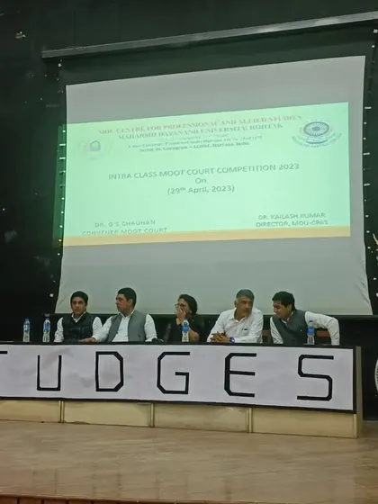 On the judges' panel at the Intra-Class Moot Court Competition. Evaluating the arguments of these bright students is a responsibility I enjoy.