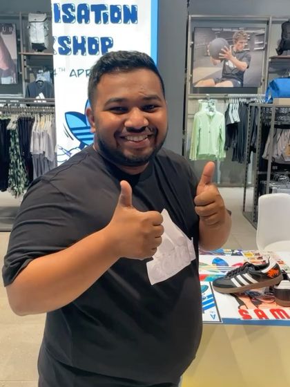 Thumbs up from a happy customer at our sneaker customization workshop. Seeing these reactions is the best part of what we do.