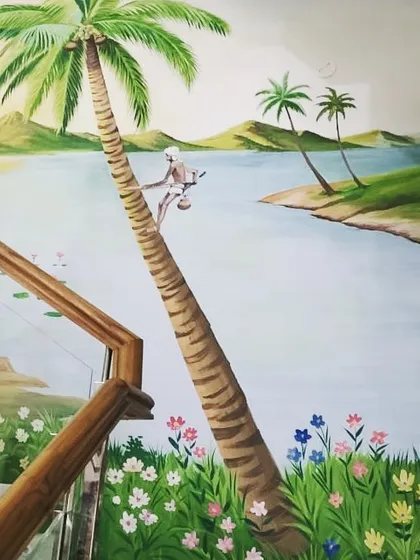 A view of the tropical mural as it wraps around a staircase. This shows how I can adapt a large-scale painting to the specific architecture of a space, making it feel fully integrated.