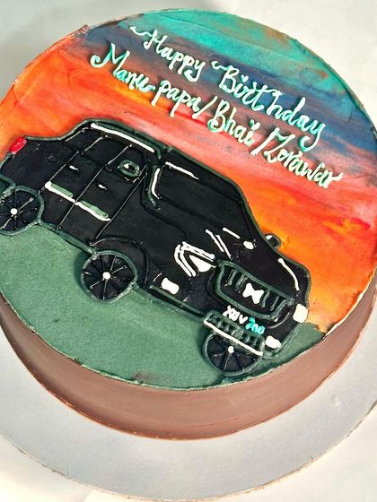 Another angle of the XUV 700 cake, showing the detail of the car and the blended colors of the sky. It's a perfect cake for any car enthusiast.