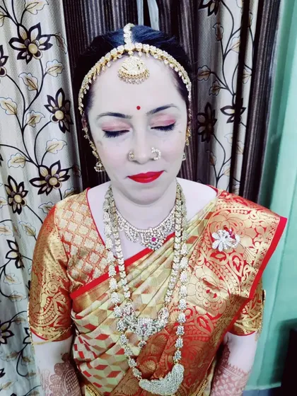 Another angle of the Varapooja makeup for Jaylakshmi, showing the smooth skin texture and soft glow.