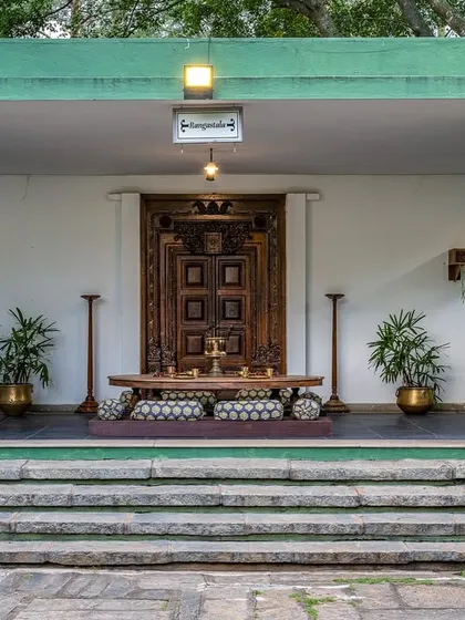 This seating area, framed by an ancient doorway, is a quiet corner to pause and soak in the atmosphere of the property.