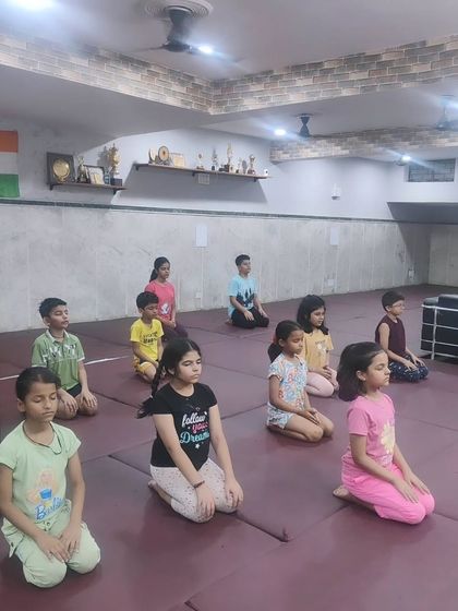 The class begins and ends with a moment of quiet focus. I teach my students that mental discipline and respect are just as important as physical skill.