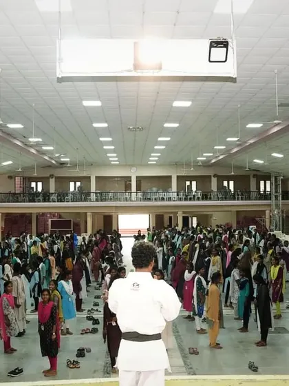 It's an amazing feeling to stand on stage and guide hundreds of young women through their first self-defense moves. My goal is to make everyone feel stronger and more aware by the end of the session.