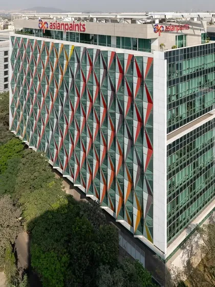The Asian Paints corporate headquarters features a dynamic, multi-colored facade that reflects the company's identity. This project showcases our ability to integrate a client's brand ethos directly into the architectural expression of their workspace.