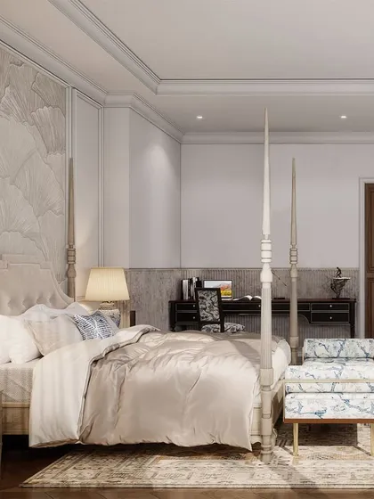 I designed this bedroom as a home away from home for a client. The palette is reminiscent of old-world charm, with period features like cornices and wainscoting. I paired these with transitional furniture, like a distressed oak four-poster bed, for a balanced look.