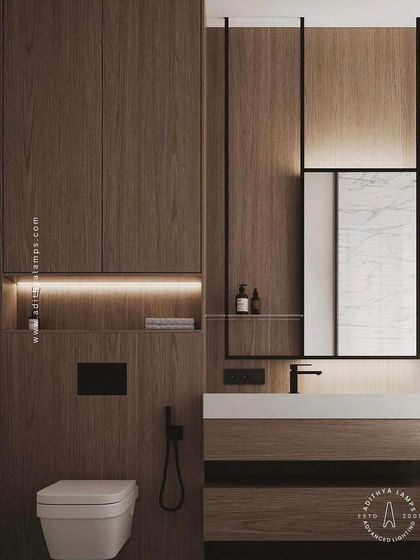 In this modern bathroom, our profile lights are used to create a beautifully lit niche and to frame the mirror. This provides excellent, shadow-free task lighting for the vanity area while adding a sophisticated, spa-like feel.