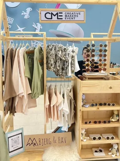 We built this house-shaped wooden stall for a children's clothing and accessories brand. The creative design helps the brand stand out and provides a playful theme that attracts families in a busy mall environment.