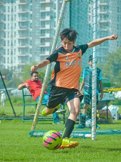 A powerful strike on goal from our U13 player during the Pride Cup.