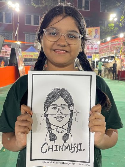 This young guest was thrilled with her caricature at the Lalbaug food festival in Parel. Festivals are one of our favorite places to sketch.