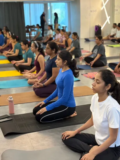 A moment of collective stillness during our International Yoga Day celebration. It is always powerful to see so many people come together to breathe and practice as one.