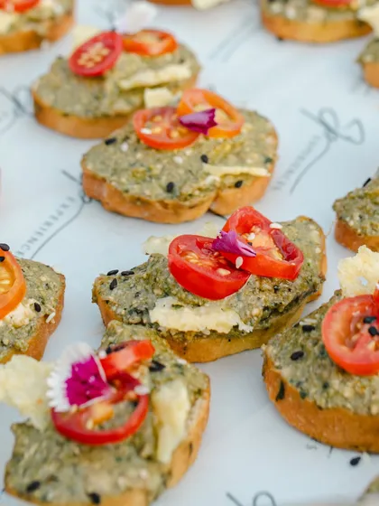Avocado & Ricotta Crostini with walnut pesto and cherry tomatoes, another delicious option from our high tea spread.
