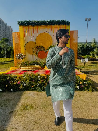 One of our choreographers at a wedding event, ready for the festivities to begin. We are present at your events to guide performers and manage the show from behind the scenes.