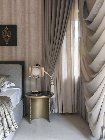 A small, framed artwork from the 'House of the Rising Sun' series, seen here in a serene bedroom setting.