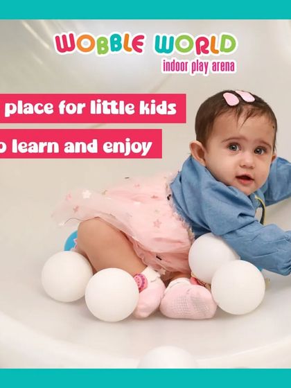 Even the tiniest babies can enjoy Wobble World. This infant is safely exploring the soft textures and shapes in our toddler-friendly zone.