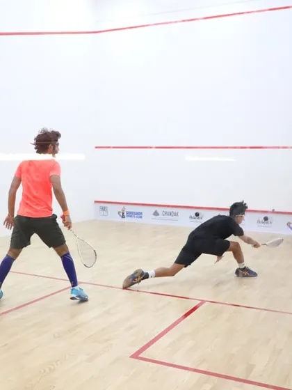 A full-stretch lunge during a quarter-final match. These are the moments of dedication that define our tournaments.