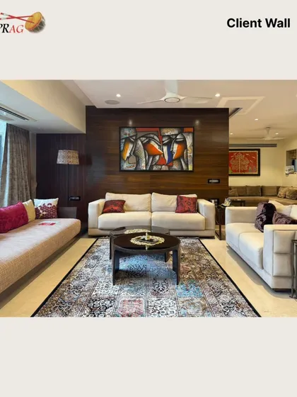 A wider view shows how a single piece of statement art can anchor an entire open-plan living area, tying together different zones with a cohesive aesthetic.