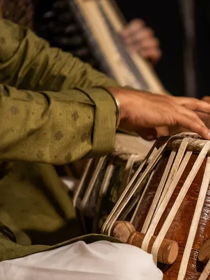 A close-up of my hands during a concert in Bangalore. The microphone is placed to capture the nuances of the tabla bols.