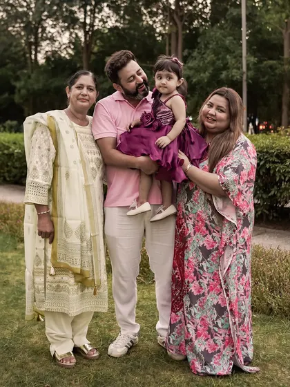 A beautiful multi-generational family portrait taken outdoors. It’s always special to include grandparents in the shoot to capture the love that spans across generations.
