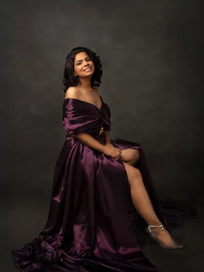 Ujala, whose name means light, celebrated her 40th birthday with this gorgeous portrait session. Dressed in a regal purple gown, she radiates elegance, strength, and the joy of self-love.