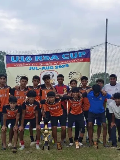 The full U16 squad posing with the runners up trophy after the RSA Cup finals. Every tournament is a valuable experience in a player's development journey.
