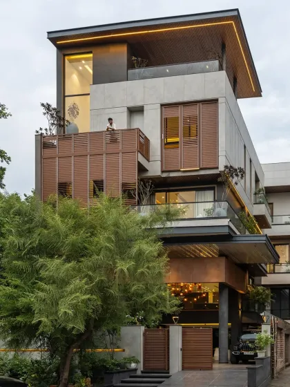 A different perspective of The Solheim House, showing how the foldable wooden screens can be opened. This detail highlights the building's adaptability and connection to the outdoors.
