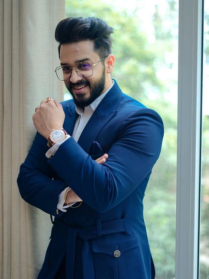 Another shot of the client in his blue suit, exuding style and personality.