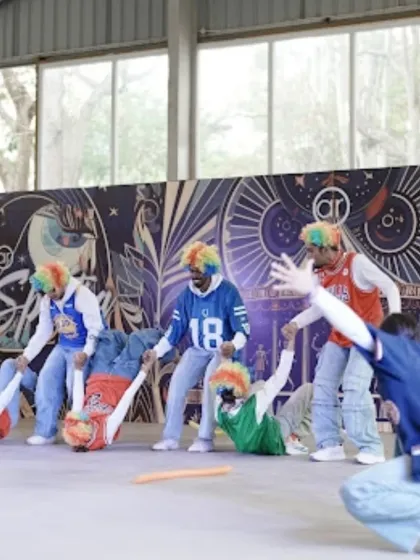 A fun, acrobatic move from the clown-themed performance at Spectra.